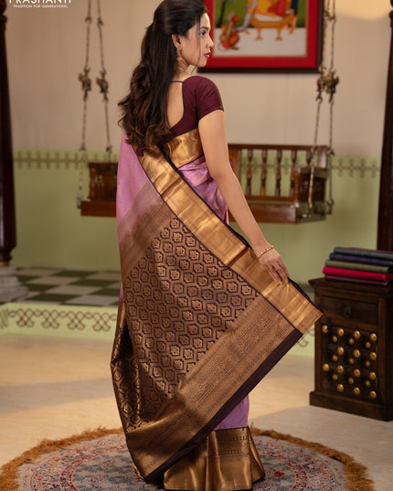 Pure kanchipuram silk saree lavender and deep jamun with allover zari woven brocade weaves and rich zari woven korvai border