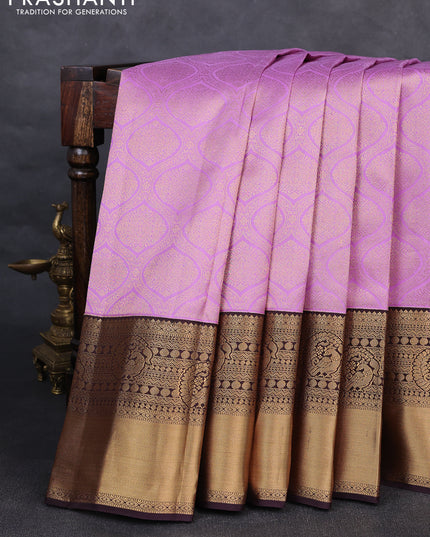 Pure kanchipuram silk saree lavender and deep jamun with allover zari woven brocade weaves and rich zari woven korvai border