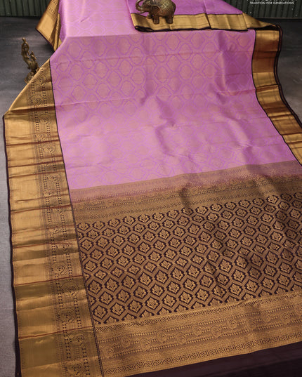 Pure kanchipuram silk saree lavender and deep jamun with allover zari woven brocade weaves and rich zari woven korvai border