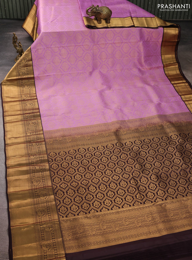 Pure kanchipuram silk saree lavender and deep jamun with allover zari woven brocade weaves and rich zari woven korvai border