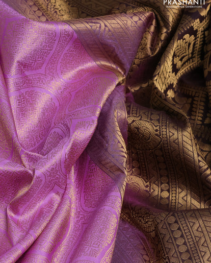 Pure kanchipuram silk saree lavender and deep jamun with allover zari woven brocade weaves and rich zari woven korvai border