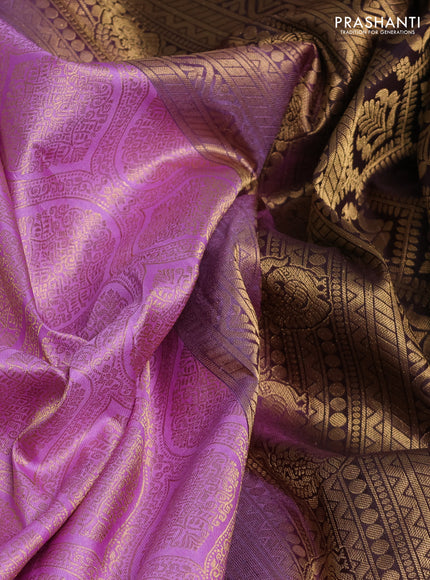 Pure kanchipuram silk saree lavender and deep jamun with allover zari woven brocade weaves and rich zari woven korvai border