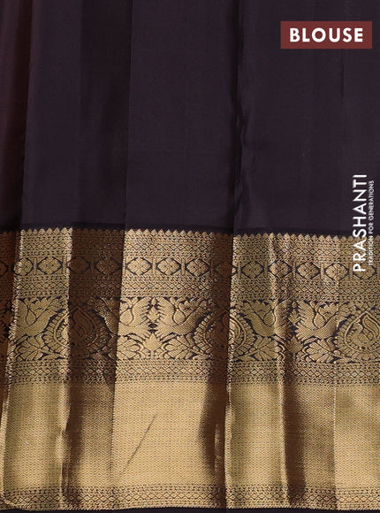Pure kanchipuram silk saree peach orange and wine shade with allover zari woven brocade weaves and rich zari woven korvai border