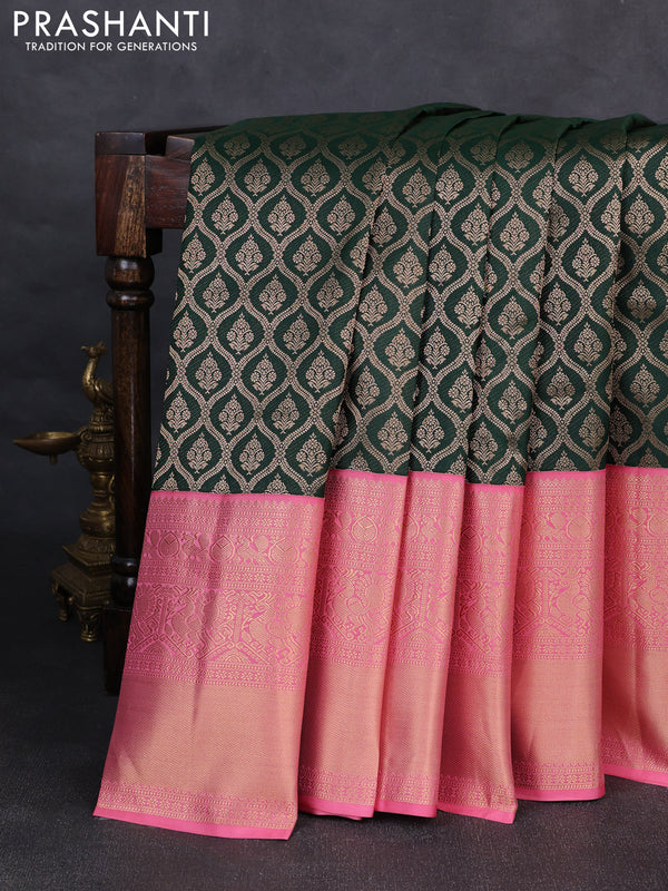 Pure kanchipuram silk saree bottle green and peach pink with allover zari woven brocade weaves and long rich zari woven korvai border