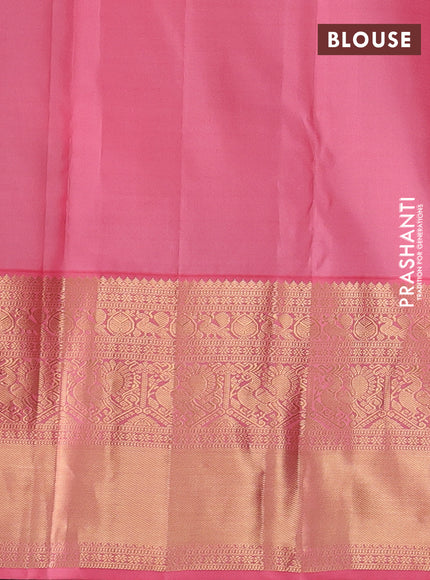 Pure kanchipuram silk saree bottle green and peach pink with allover zari woven brocade weaves and long rich zari woven korvai border