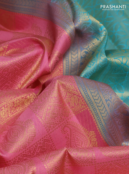 Pure kanchipuram silk saree light pink and teal blue with allover zari woven brocade weaves and long rich zari woven korvai border