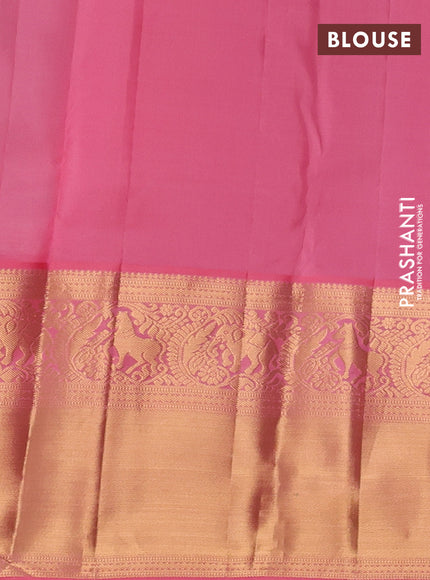 Pure kanchipuram silk saree teal blue and peach pink with allover zari woven brocade weaves and long rich zari woven korvai border