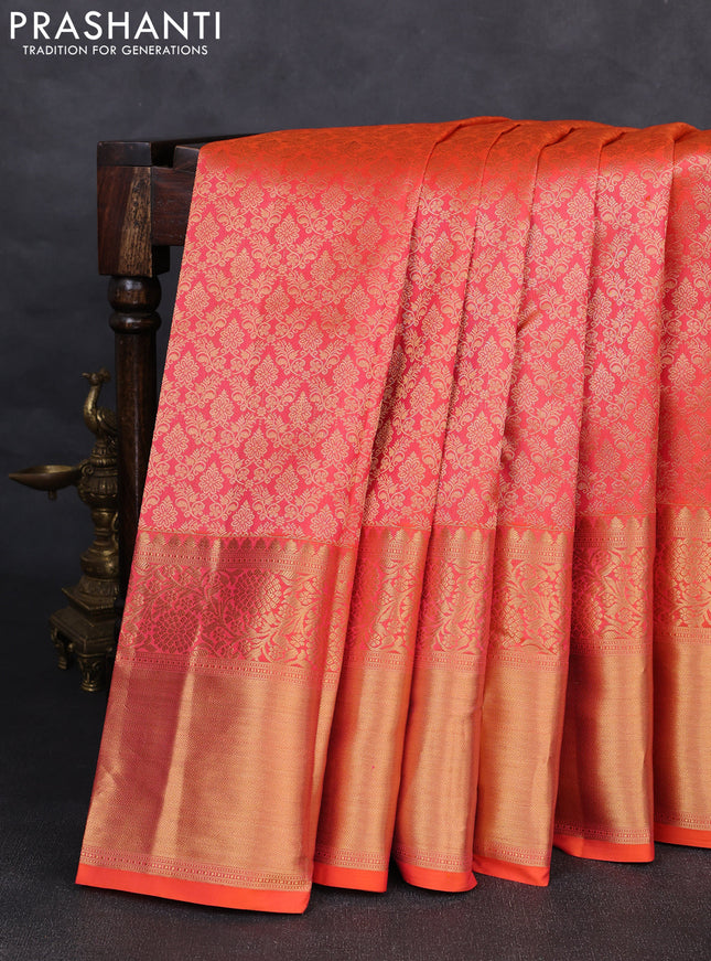 Pure kanchipuram silk saree orange with allover zari woven brocade weaves and long rich zari woven border