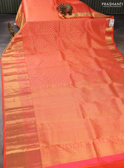 Pure kanchipuram silk saree orange with allover zari woven brocade weaves and long rich zari woven border