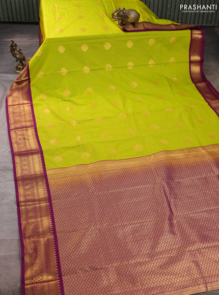 Semi kanchipuram silk saree light green and magenta pink with allover zari weaves & buttas and zari woven border