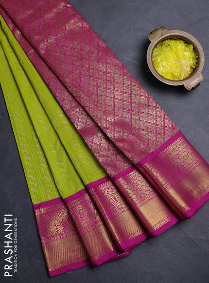 Semi kanchipuram silk saree lime green and pink with allover zari weaves pattern and zarinwoven korvai border