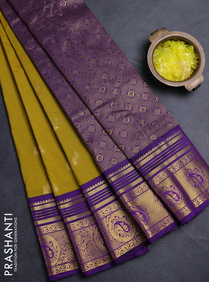 Semi kanchipuram silk saree mustard green and deep purple with allover zari woven buttas and zari woven border