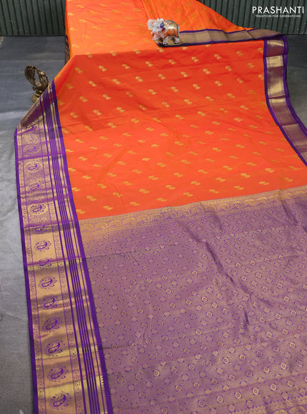 Semi kanchipuram silk saree orange and deep purple with allover zari woven buttas and zari woven border