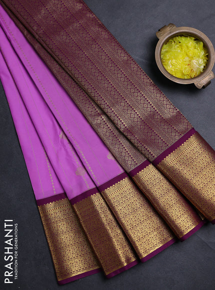 Semi kanchipuram silk saree lavender shade and purple with allover zari weaves & buttas and long zari woven border