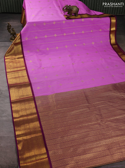 Semi kanchipuram silk saree lavender shade and purple with allover zari weaves & buttas and long zari woven border