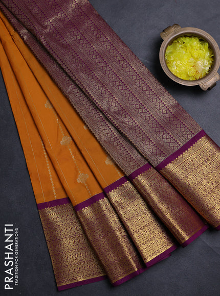 Semi kanchipuram silk saree mustard yellow and purple with allover zari weaves & buttas and zari woven border