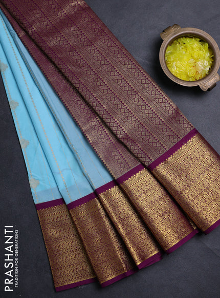 Semi kanchipuram silk saree teal blue and purple with allover zari weaves & buttas and zari woven border