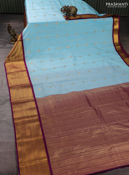Semi kanchipuram silk saree teal blue and purple with allover zari weaves & buttas and zari woven border