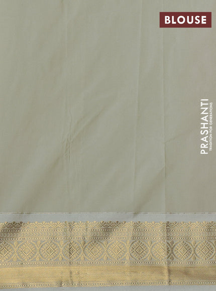 Semi kanchipuram silk saree rust shade and mild pista green with allover zari weaves & buttas and zari woven border