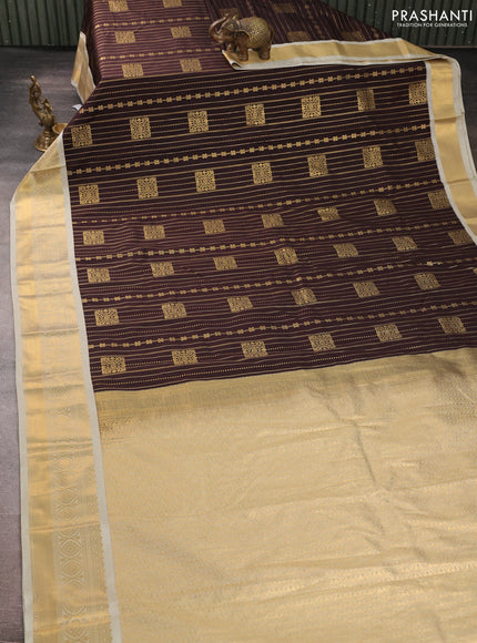 Semi kanchipuram silk saree coffee brown and mild pista green with allover zari weaves & buttas and zari woven border