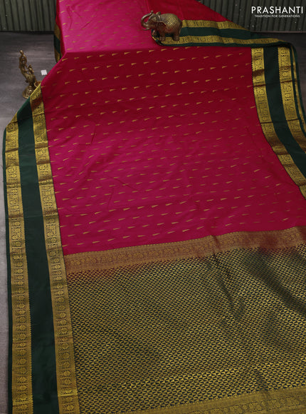 Semi kanchipuram silk saree tomato pink and green with allover zari woven buttas and rettapet zari woven border