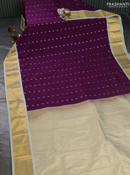 Semi kanchipuram silk saree deep purple and mild pista green with allover zari woven buttas and zari woven border
