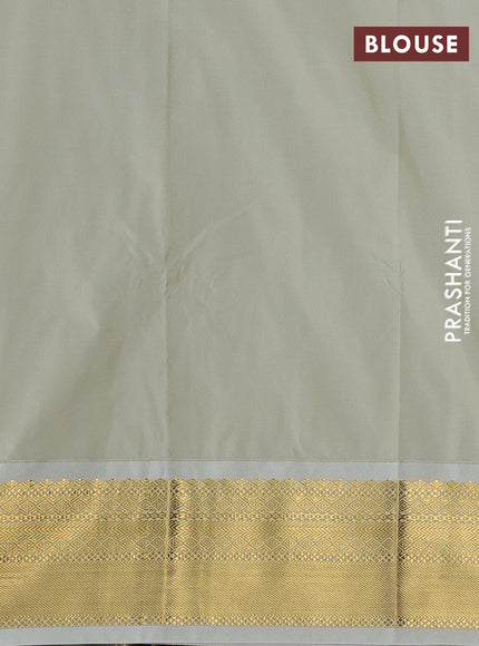 Semi kanchipuram silk saree deep purple and mild pista green with allover zari woven buttas and zari woven border