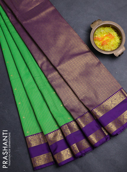Semi kanchipuram silk saree green and violet with allover zari checks & buttas and rettapet zari woven border