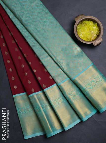 Semi kanchipuram silk saree maroon and teal green with allover zari woven buttas and zari woven border