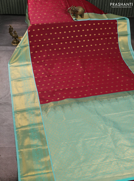 Semi kanchipuram silk saree maroon and teal green with allover zari woven buttas and zari woven border