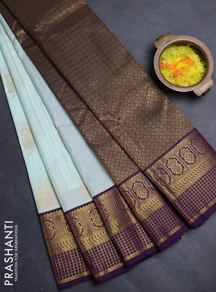 Semi kanchipuram silk saree pastel blue and purple with allover zari weaves & buttas and zari woven border