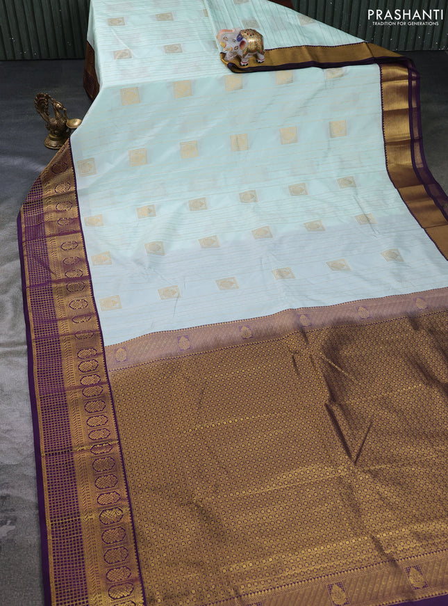 Semi kanchipuram silk saree pastel blue and purple with allover zari weaves & buttas and zari woven border
