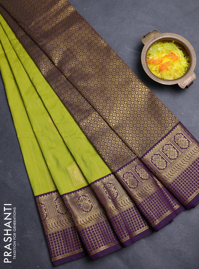 Semi kanchipuram silk saree lime green and purple with allover zari weaves & buttas and zari woven border