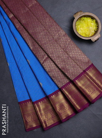 Semi kanchipuram silk saree cs blue and magenta pink with allover zari weaves & buttas and zari woven border