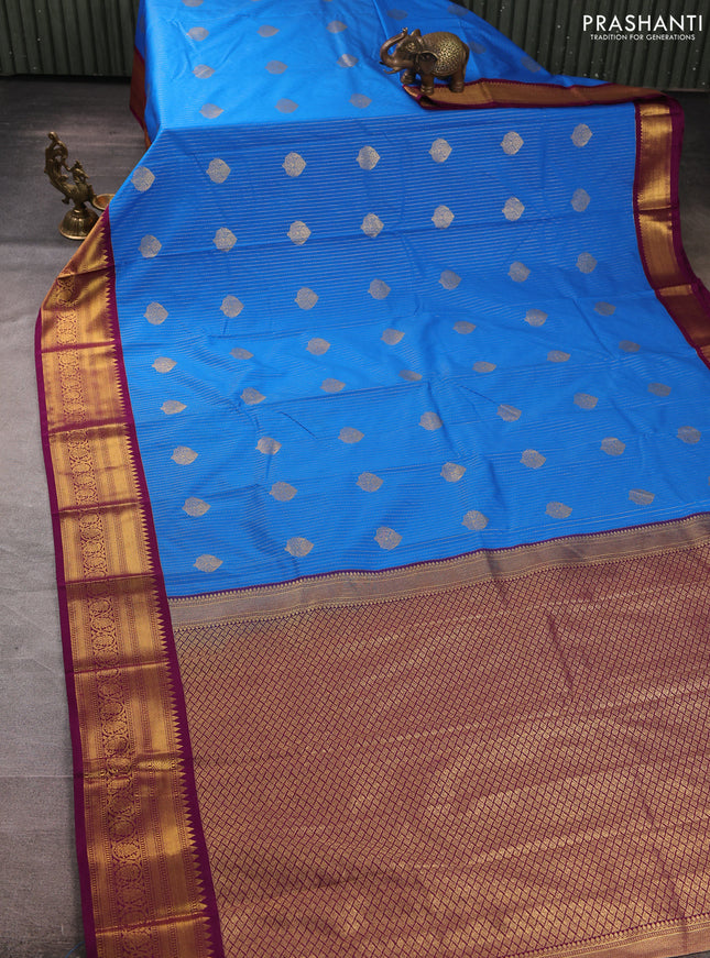 Semi kanchipuram silk saree cs blue and magenta pink with allover zari weaves & buttas and zari woven border