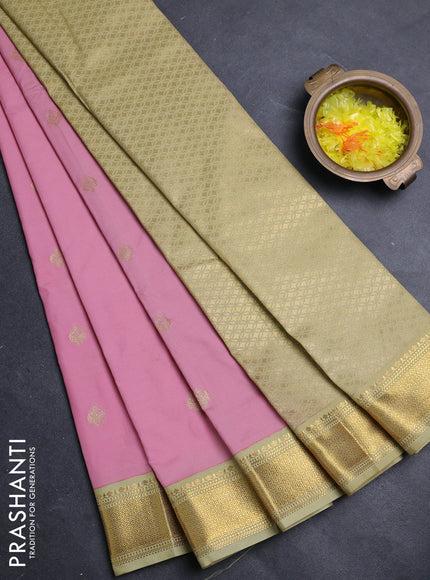 Semi kanchipuram silk saree peach pink and pista green with zari woven buttas and zari woven border