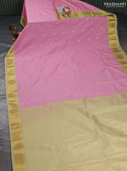 Semi kanchipuram silk saree peach pink and pista green with zari woven buttas and zari woven border