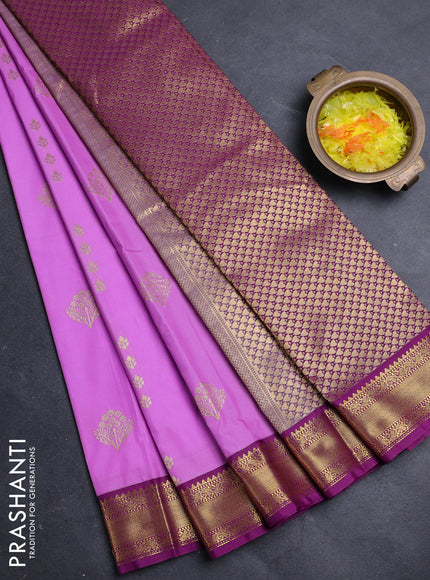 Semi kanchipuram silk saree lavender and purple with zari woven buttas and zari woven korvai border