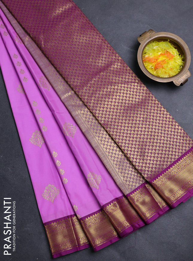 Semi kanchipuram silk saree lavender and purple with zari woven buttas and zari woven korvai border