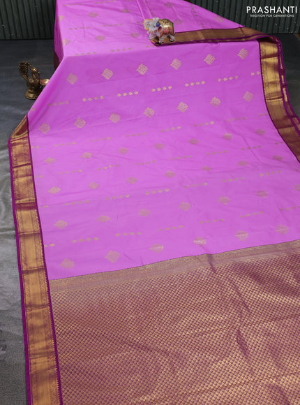 Semi kanchipuram silk saree lavender and purple with zari woven buttas and zari woven korvai border