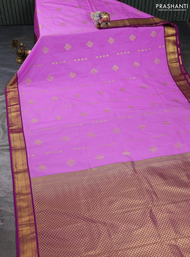 Semi kanchipuram silk saree lavender and purple with zari woven buttas and zari woven korvai border