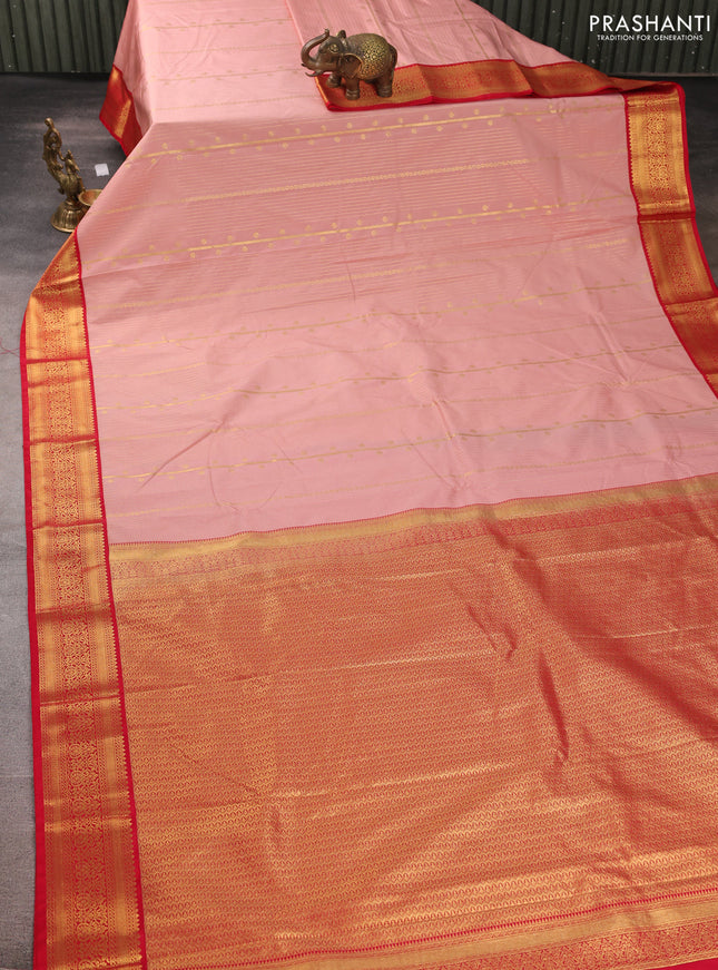 Semi kanchipuram silk saree peach shade and red with allover zari weaves & buttas and zari woven border