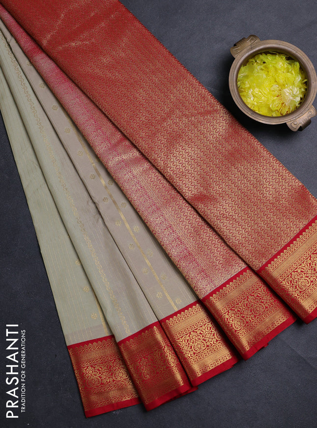 Semi kanchipuram silk saree mild pista green and red with allover zari weaves & buttas and zari woven border