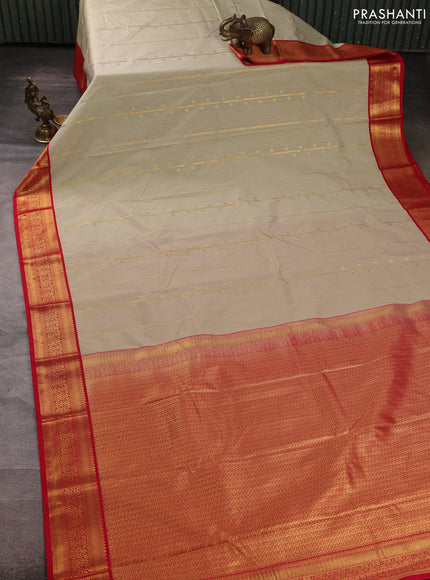 Semi kanchipuram silk saree mild pista green and red with allover zari weaves & buttas and zari woven border