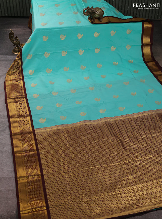 Semi kanchipuram silk saree teal green and deep maroon with zari woven buttas and zari woven border