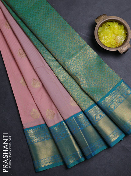 Semi kanchipuram silk saree mild peach pink and green with allover zari weaves & buttas and zari woven border