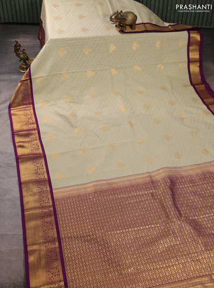 Semi kanchipuram silk saree mild pista green and deep purple with allover zari weaves & buttas and zari woven border