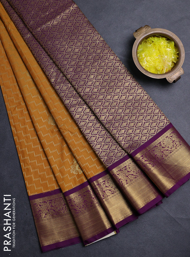 Semi kanchipuram silk saree mustard yellow and purple with allover zari weaves & buttas and zari woven border
