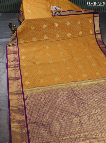 Semi kanchipuram silk saree mustard yellow and purple with allover zari weaves & buttas and zari woven border