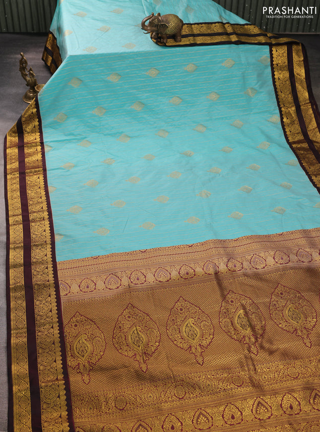Semi kanchipuram silk saree teal blue and deep maroon with allover zari weaves & buttas and rettapet zari woven border
